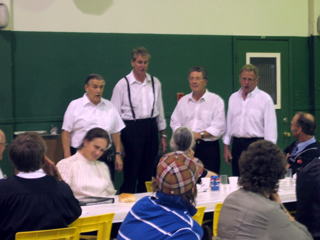 Our men's group singing in Lacolle